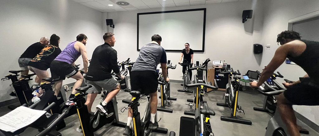 The Psychology of Group Spin Classes: Motivation, Accountability, and Mental Health Benefits